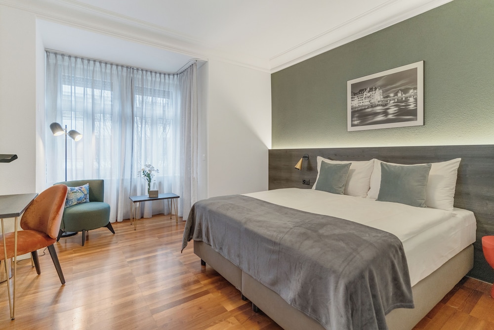 Habitación Triple del hotel Waldstaetterhof Swiss Quality