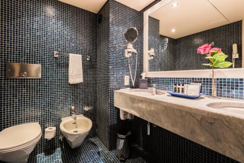 Habitación Doble Deluxe con balcón y vistas al parque o al lago del hotel Royal Plaza Montreux