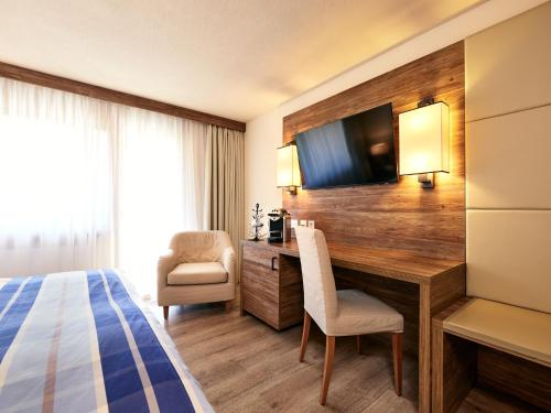 Habitación Doble con vistas al Matterhorn - 2 camas del hotel Ambassador Zermatt. Foto 1