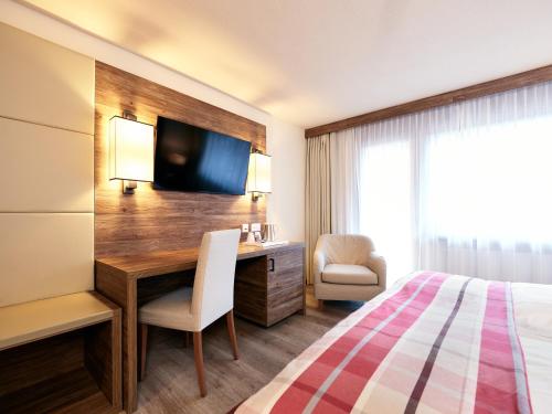 Habitación Doble Estándar - 2 camas del hotel Ambassador Zermatt. Foto 1