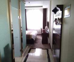  Kuerle Jinrun Holiday Hotel Airport Road