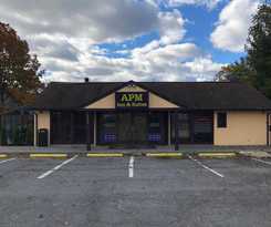 Apm Inn and Suites