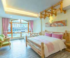 Floral Hotel Fenghuang Huercaowu