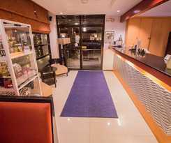 Hotel The Red Palm Suites And Restaurant