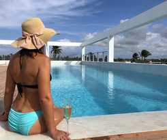 Ducassi Suites Rooftop Pool Beach Club and Spa