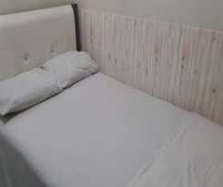Oyo 90706 Kost Alam Jaya Syariah