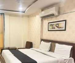 Fabhotel Prime Golden Feather