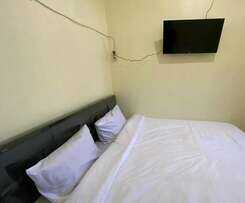 SPOT ON 93452 Wulan Homestay 2 Syariah