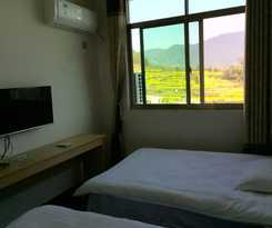 Hotel Wuyuan Jiangling View Inn