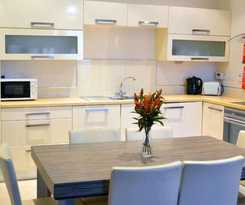 Carrick Plaza Suites and Apartments