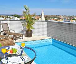 Hotel Plaza Inn Flat Arax&aacute;