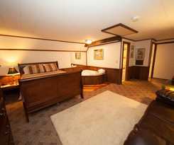 Log Cabin Lodge and Suites