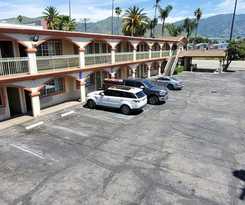 Hotel Delmonico Inn and Suites