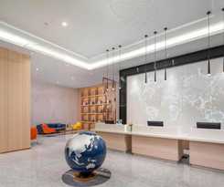 Hotel Kyriad Guigang Wuyue Plaza Railway Station