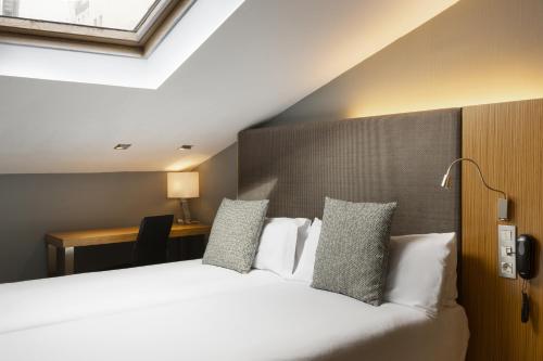 Habitación doble del hotel Petit Palace Tres Cruces. Foto 1